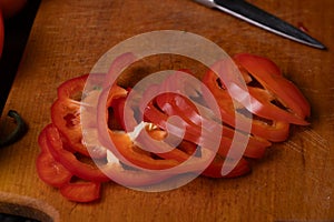 Sliced red pepper on a cutting board.