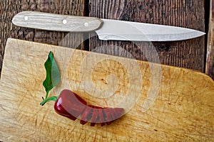 Sliced red pepper on a wooden cutting board