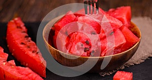 sliced red watermelon into pieces