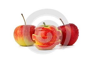 Sliced ripe apple over white background