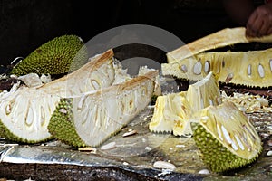 Sliced ripe jackfruit on the counter at a local market of fruit and vegetable