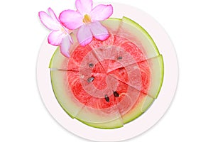 Sliced ripe watermelon fruit on white background.