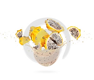 Sliced ripe yellow dragon fruits pitahaya with splashes of fresh juice, isolated on a white background