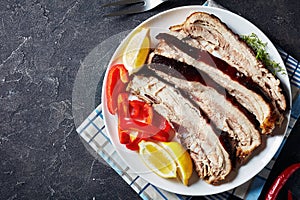 Sliced roast pork belly on a plate