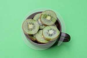 sliced round green pieces of fresh kiwi fruit