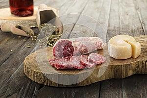 Sliced salami on board