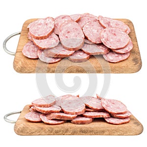 Sliced salami sausage on a cutting board. Isolated on white back