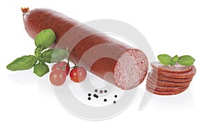 Sliced salami sausage isolated on white background