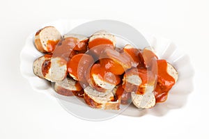 Sliced sausage with sauce