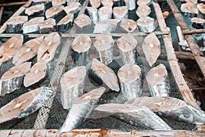 Sliced sea fish wilts in the open air