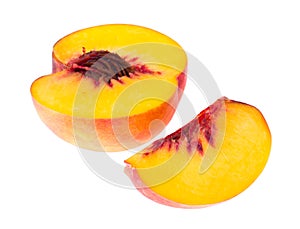 Sliced slices of fresh ripe peach on white background