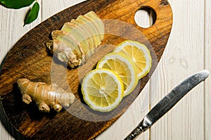 Sliced slices of lemons and ginger. Prevention of colds and viruses. Organic medicine