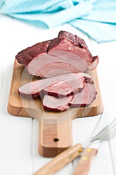 Sliced smoked pork meat