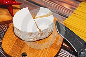 Sliced soft cheese ready to cooking