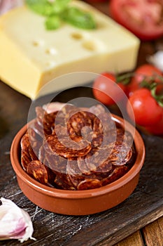 Sliced spanish chorizo, garlic, tomato and cheese