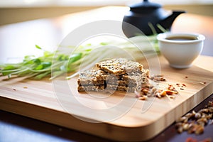 sliced sprouted bread on a bamboo board