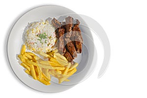 Sliced steak with rice and fries sides photo