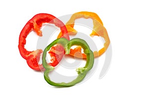 Sliced sweet bell pepper isolated on white background. top view