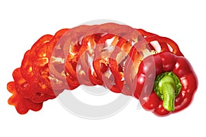 Sliced sweet red bell pepper in creative shape on white, isolated, top view