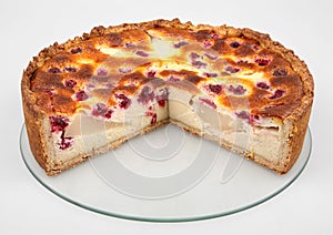 Sliced tart with raspberries photo