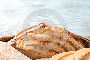 Sliced tasty bread in basket, closeup