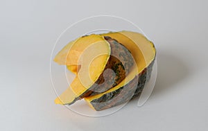 Sliced Thai yellow pumpkin isolated with white background
