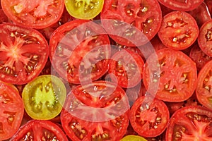 Sliced tomatoes background.