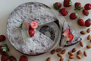 Sliced Torta caprese. Chocolate and almond cake. A yummy chocolaty flourless cake from the Capri island, Italy