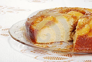 Sliced Upside Down Pear Cake On Glass Plate