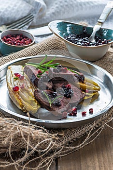 Sliced venison steak dinner