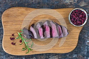 Sliced venison steak photo