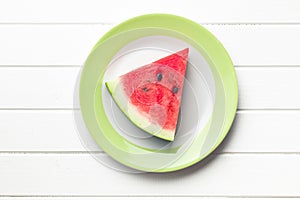 Sliced watermelon on kitchen table