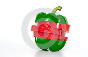 Sliced wet red and green pepper or Bell pepper on white background, slice and rearrange by two green parts on top and bottom and