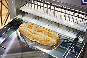 Sliced bread in cutting machine