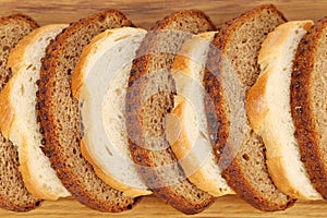 Sliced white and brown loaf of bread.