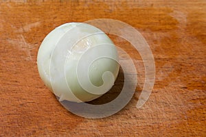 Sliced white onion on the board during the preparation of meals. Protection against the flu and colds.