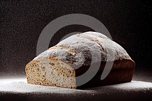 Sliced Whole grain bread on dark black background. Loaf wheat fresh baking, food styling on wooden table. Generative AI