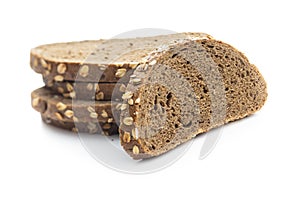 Sliced whole grain bread with oat flakes
