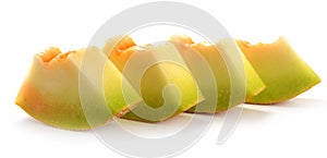 Sliced yellow honeydew melon isolated on white background