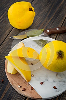 Sliced yellow quince or queen apple autumn fruits with seeds