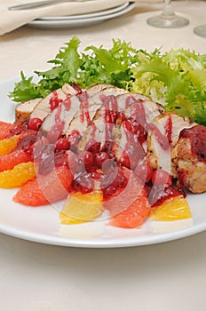 Sliced â€‹â€‹baked fillet with cranberry sauce