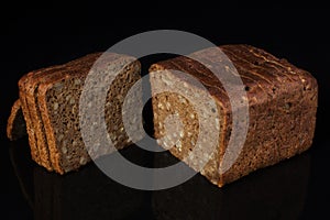 Sliced â€‹â€‹black bread on a black background