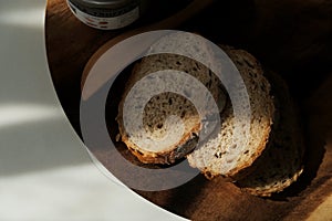 sliced â€‹â€‹french bread on wood plate