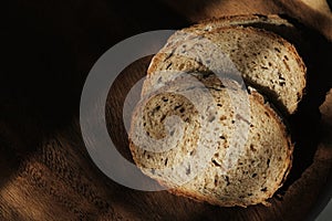 sliced â€‹â€‹french bread on wood plate