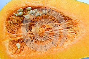 Sliced â€‹â€‹pumpkin with seeds, close-up.