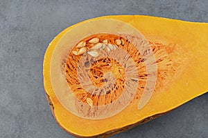 Sliced â€‹â€‹pumpkin with seeds, close-up.