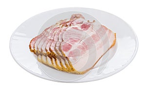 Slices of bacon in glass plate isolated on white