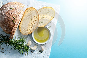 Slices of bread with rosemary, garlic and olive oil.