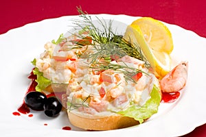 Slices of bread with shrimp salad