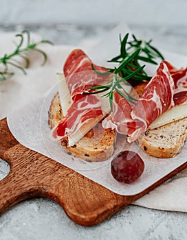 Slices of bread with spanish serrano ham